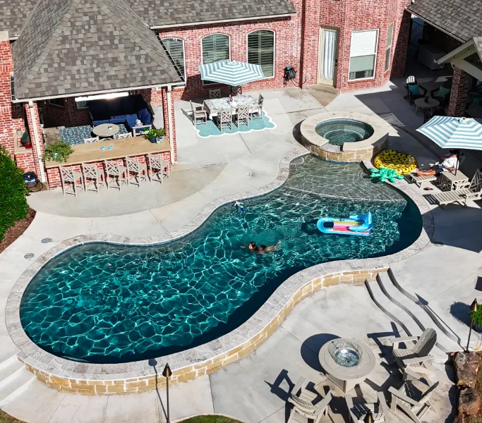 Custom concrete pool with spa in Edmond, Oklahoma